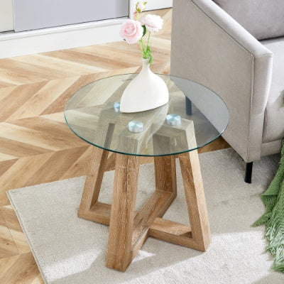 Modern And Practical Round Table. Made Of Clear Tempered Glass Top And Wood-coloured MDF Material. Suitable For Living Rooms And Bedrooms