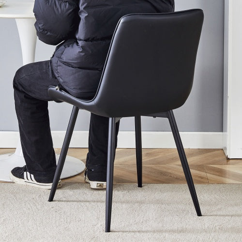 Extended Seat Cushion PU Black Dining Chair Set - Four Pieces,Ergonomic Design.Smooth Line Design,Integral Metal Leg Structure,Can Integrate Well Into Various Modern Home Decoration Styles.