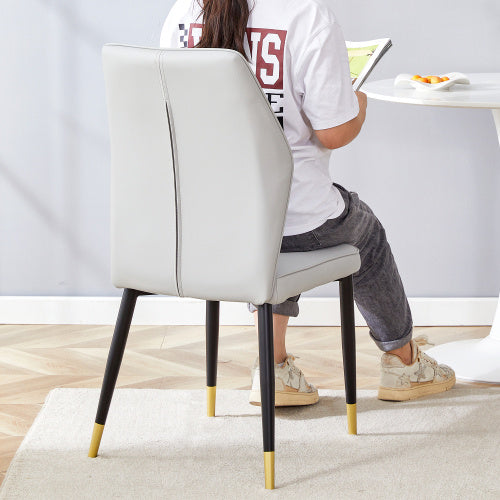 4 Light Gray Modern Dining Chairs With Stylish PU Patterned Backrest And Black Metal Legs For A Comfortable Home Experience In The Kitchen, Bedroom And Office.