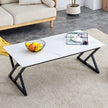 A Coffee Table Made Of Rock Slab Material, With A Smooth And Natural Surface That Complements The Modern Design Of The Black Metal Legs, Making It Suitable For Living Rooms Of All Sizes.47X23.6