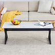 A Coffee Table Made Of Rock Slab Material, With A Smooth And Natural Surface That Complements The Modern Design Of The Black Metal Legs, Making It Suitable For Living Rooms Of All Sizes.47X23.6