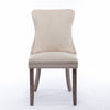 A A Upholstered Wing-Back Chair With Nailhead Trim & Solid Wood Leg