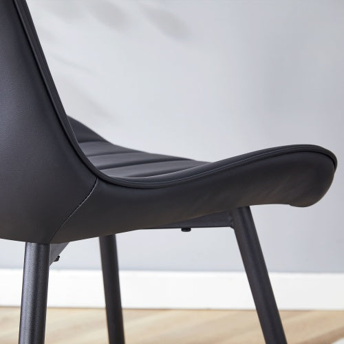 Extended Seat Cushion PU Black Dining Chair Set - Four Pieces,Ergonomic Design.Smooth Line Design,Integral Metal Leg Structure,Can Integrate Well Into Various Modern Home Decoration Styles.