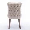 A A Upholstered Wing-Back Chair With Nailhead Trim & Solid Wood Leg