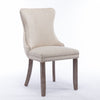 A A Upholstered Wing-Back Chair With Nailhead Trim & Solid Wood Leg